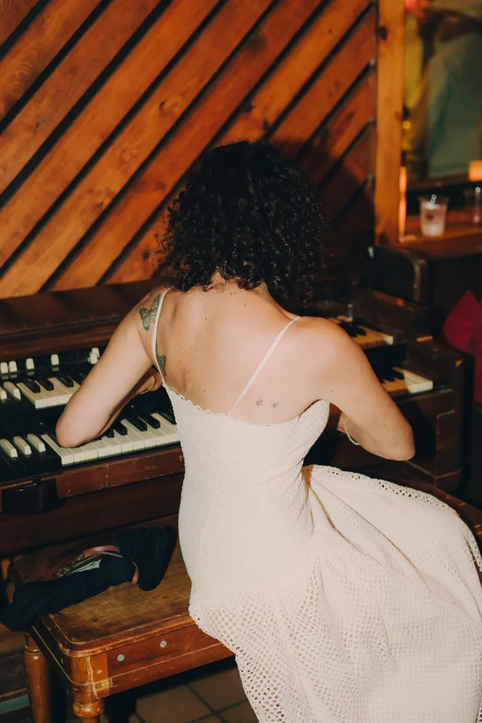Musician playing an organ
